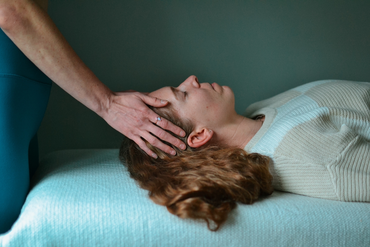 "Sheila practicing Reiki on a client in Portsmouth"
