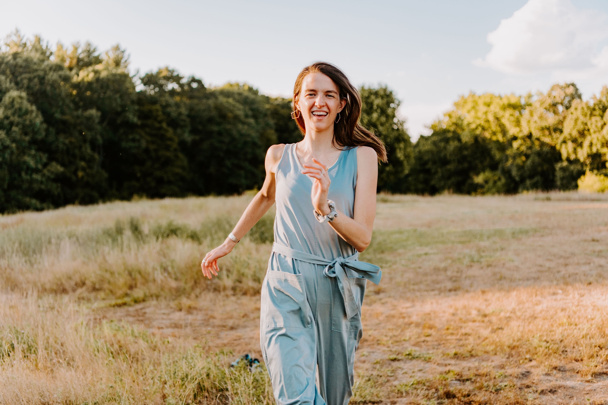 Sheila running through a field